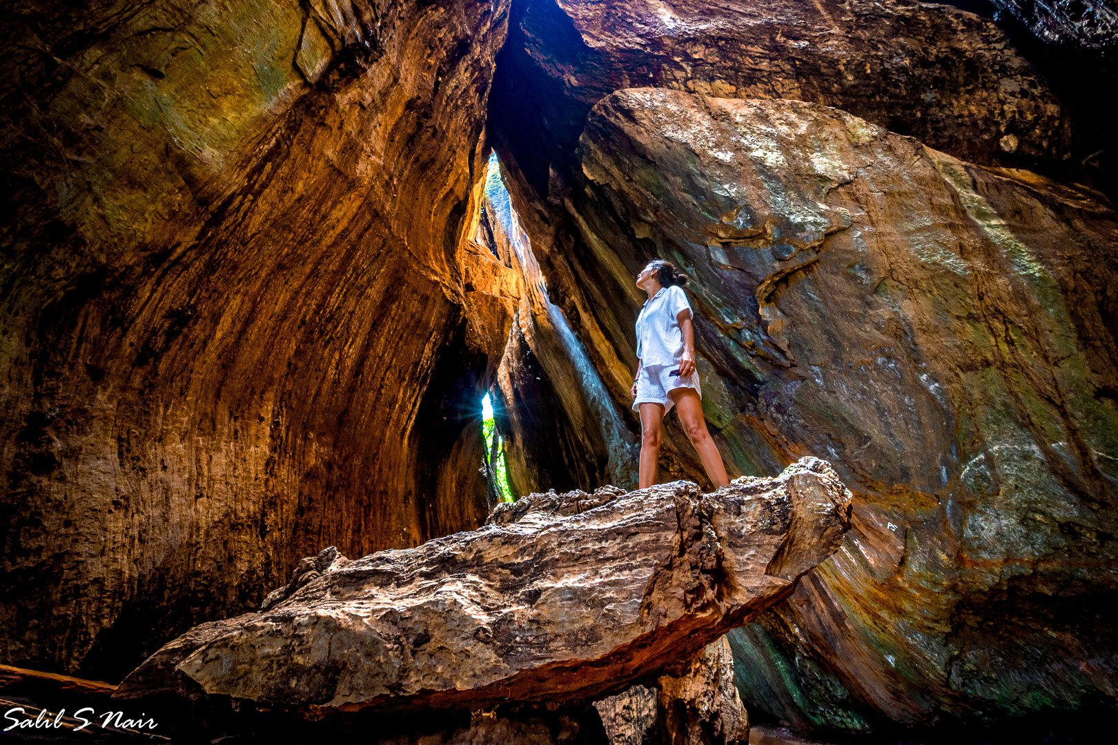 Photographer exploring a cave — signature adventure shoot — thumbnail